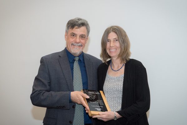 Laura Reynolds receives award from dean of college