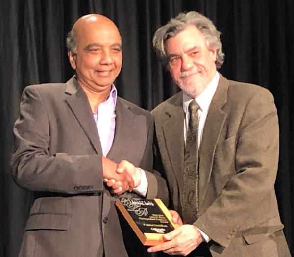 Dr. Unnithan receiving award