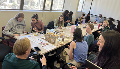 students visiting over coffee